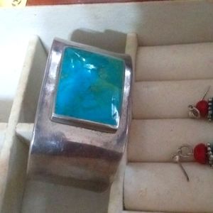 Turquoise stone on silver bracelet